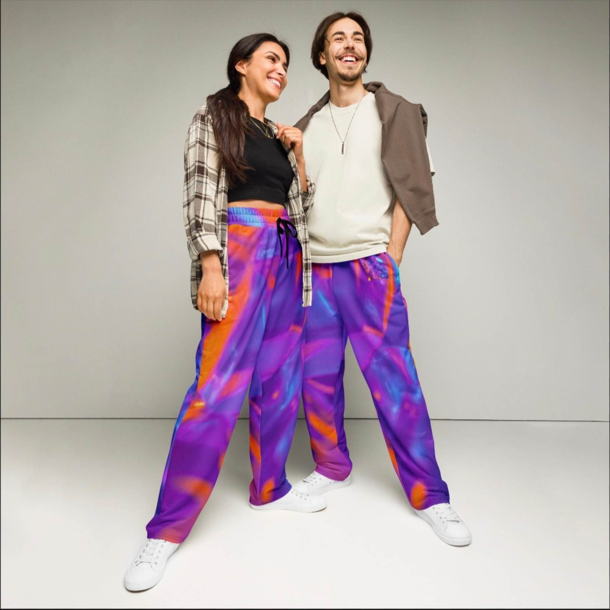 Vibrant Geometric Unisex Wide-Leg Joggers.         🚚
ᶠʳᵉᵉ ˢʰⁱᵖᵖⁱⁿᵍ ⁱⁿᶜˡᵘᵈᵉᵈ